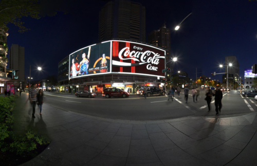 Backpacker hostel Kings Cross Sydney iconic Coca-Cola billboard King's Cross